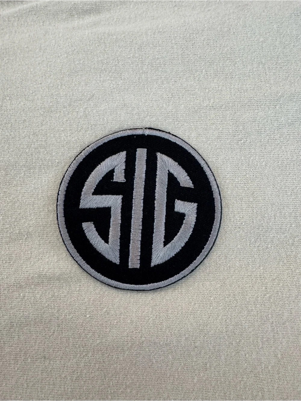 Embroidered SIG logo Round Iron on Patch - Men Accessories